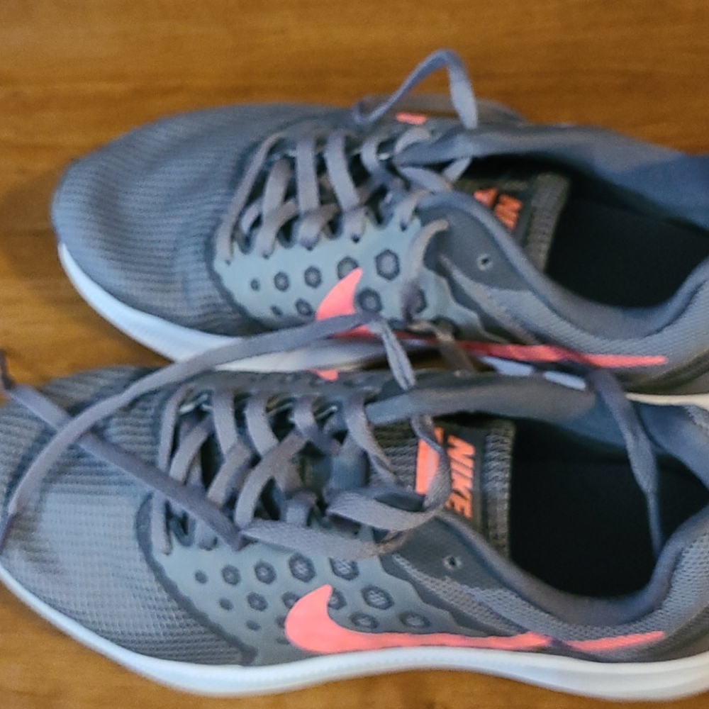 Gray Nike running shoes